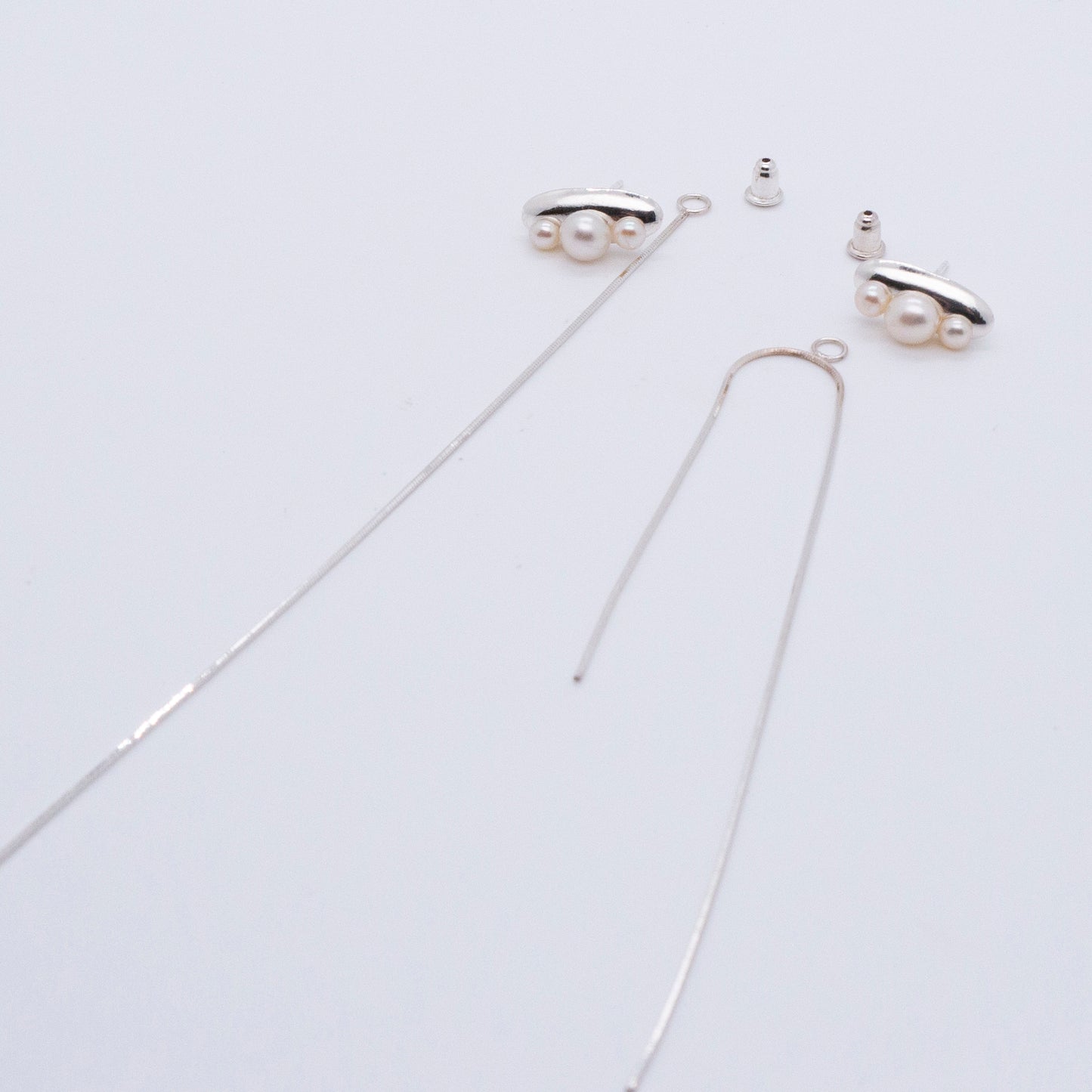 Multiverse - Time Travel Baby Pearl Earrings + Asymmetric Thread Earring Backs (Silver) 